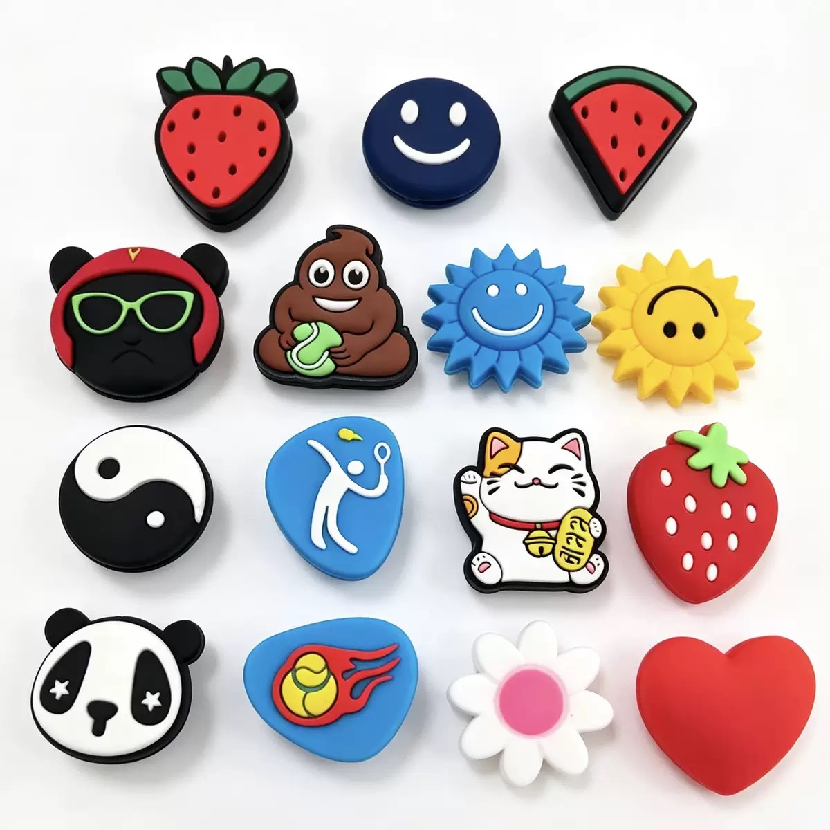 Organized assortment of colorful custom-shaped silicone tennis dampeners