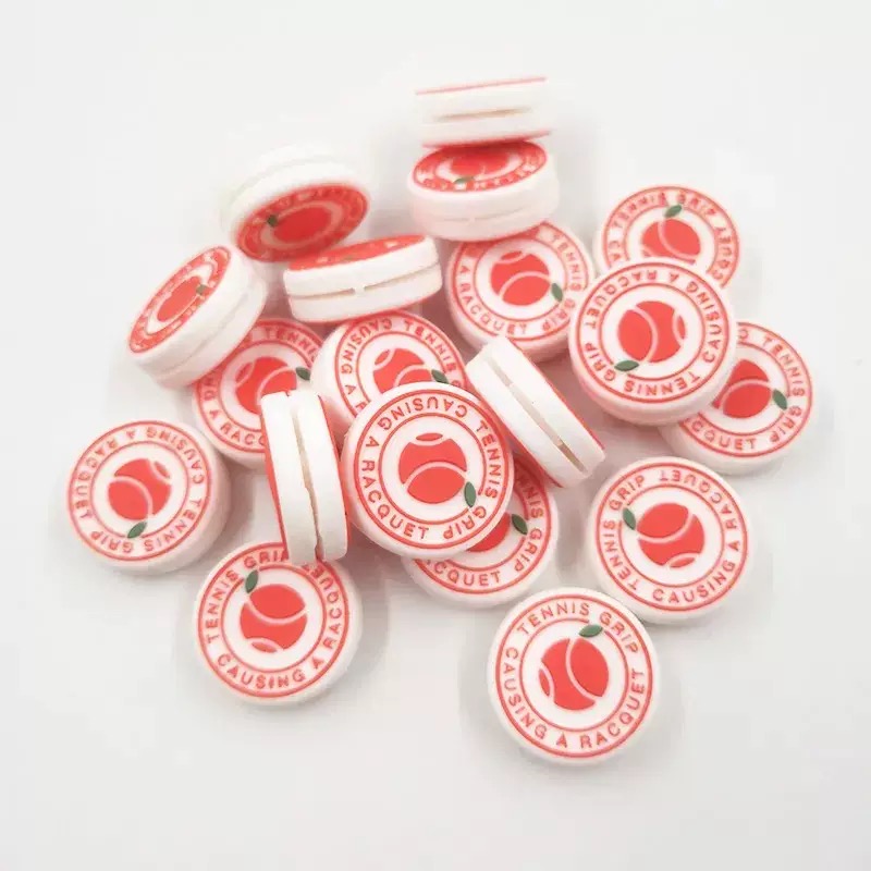 Batch of red and white custom-logo tennis dampeners