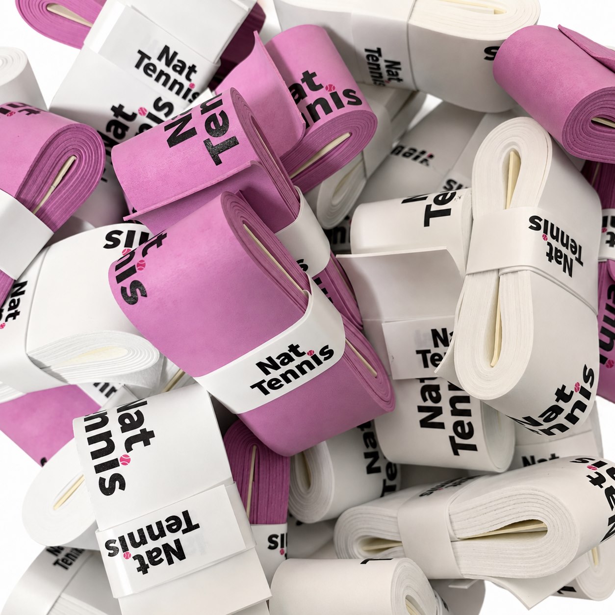 Production batch of pink and white branded overgrips