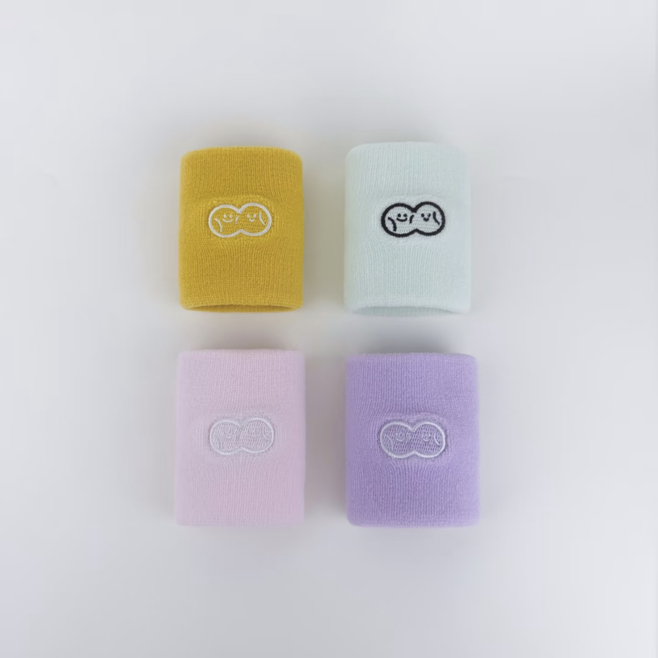 Pastel custom wristbands with embroidered logo options