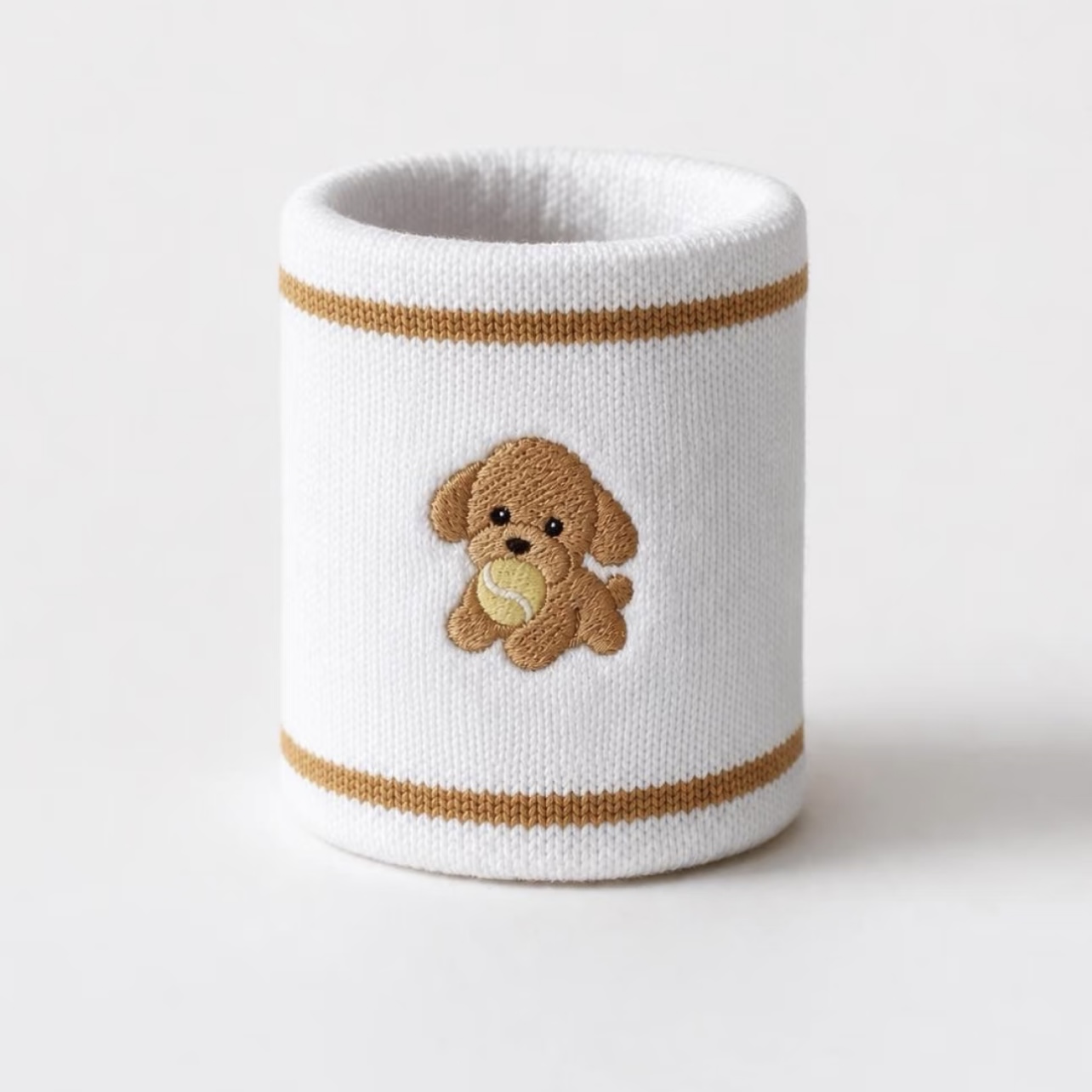 White wristband with brown trim and embroidered dog mascot